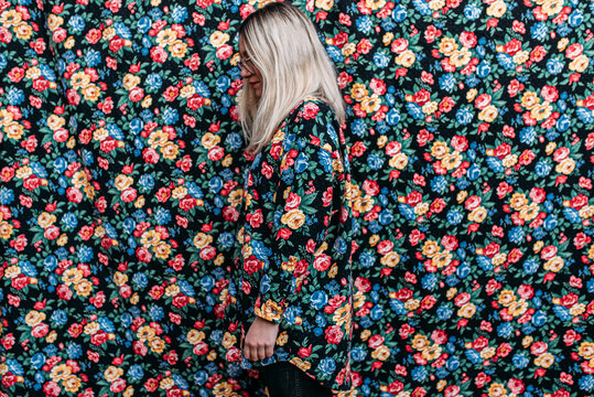 Girl with matching shirt and background.