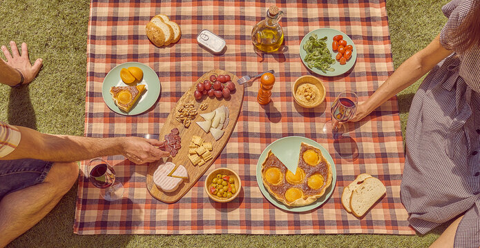 Couple at a picnic in the grass