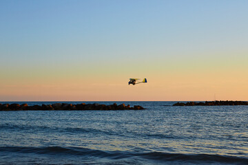 airplane, sunset on the beach