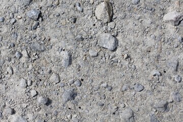 A close view of the rocks on the hard ground surface.