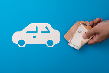 Car and insurance concept money.