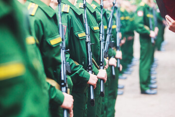 A formation line of russian army soldiers troops in military formation in uniform with chevron...
