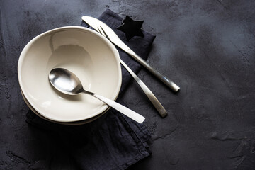 Cutlery set on black background