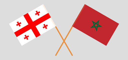 Crossed flags of Morocco and Georgia