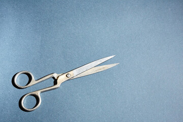 scissors on a blue background