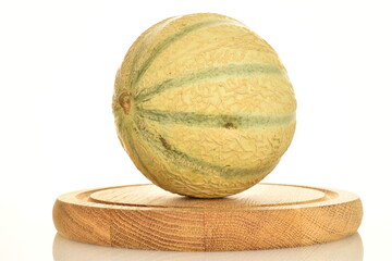  fragrant organic melons, close-up, on a white background.