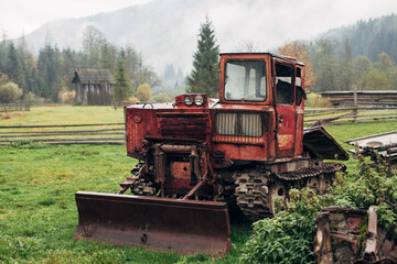 old tracked skidder in the village