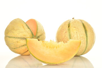  fragrant organic melons, close-up, on a white background.