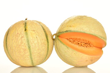  fragrant organic melons, close-up, on a white background.