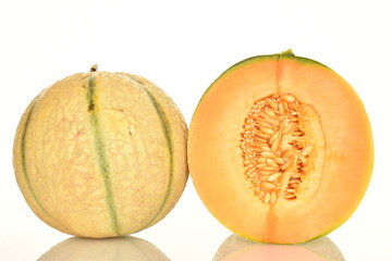  fragrant organic melons, close-up, on a white background.