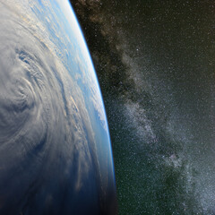Tropical storm and the Milky Way. Elements of this image furnished by NASA.