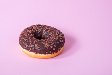 Colorful delicious donuts with sugar glaze on top