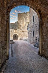 Fototapeta premium An arch leading into an alleyway in the old town Dubrovnik Croatia, Europe