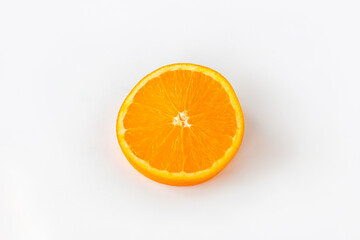 Cut orange on a white background. Natural orange fruit with cut slices. Vitamin C.