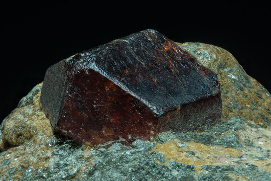 Semiprecious stone corundum ruby in the rock.