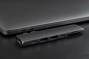 Close-up photo of type-c hub and laptop