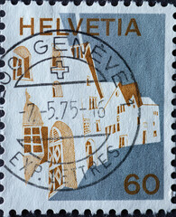 Switzerland - Circa 1973 : a postage stamp printed in the swiss showing a graphic representation of Scual in the canton of Graubünden