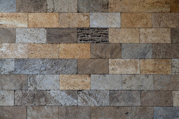 Sawn stone wall, stone structure.