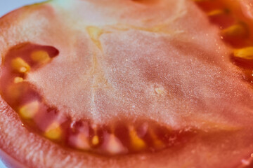 close up of a slice of tomato 