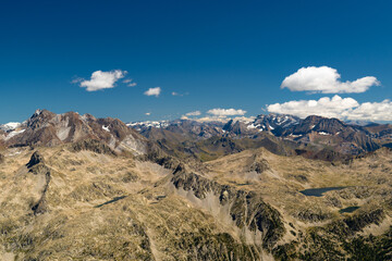 Views from the top of the Garmo Negro of the Vignemale peak, Bacias and lakes and Brazatos mountain in the Pyrenees