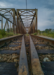 Rails at railway bridge over river in Wroclaw