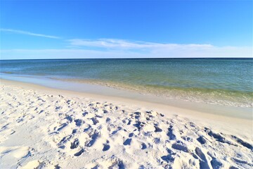 Sand, ocean, sky, tranquility and relaxation, photo taken on the beach of Santa Rose Island, Gulf of Mexico