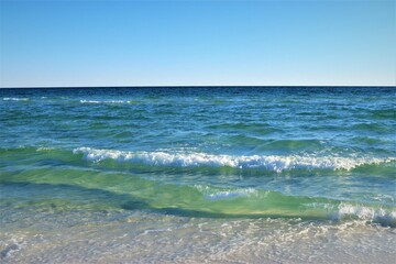 Sand, ocean, sky, tranquility and relaxation, photo taken on the beach of Santa Rose Island, Gulf of Mexico
