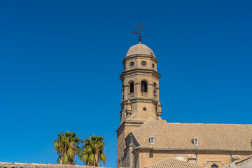 Obraz premium Old stoned alley with view to the church in Baeza city, declared along with Ubeda as world heritage by unesco