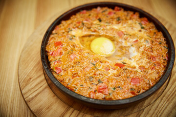 vegetables and meat in a pan