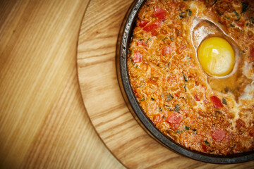 vegetables and meat in a pan