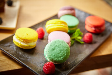 macaroons on wooden background