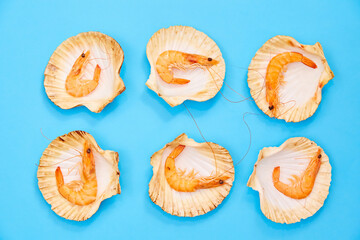 Shrimp in Shell on Blue Background. Seafood. Creative Feed