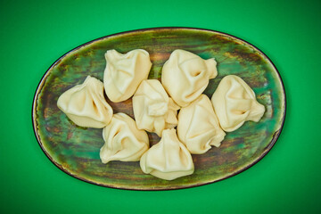 Hinkali Georgian Dish on a Green Plate