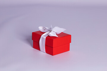 Obraz premium Gift in a red box with a bow