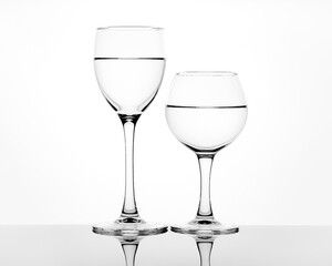 Liquid in a wine glass isolated on white background
