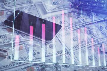 Double exposure of forex graph drawing over us dollars bill background. Concept of financial markets.