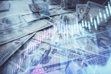 Multi exposure of forex chart drawing over us dollars bill background. Concept of financial success markets.