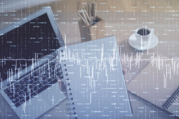 Double exposure of businesswoman hands typing on computer and forex chart hologram drawing. Financial analysis concept.