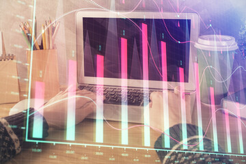 Double exposure of woman hands typing on computer and forex chart hologram drawing. Stock market invest concept.