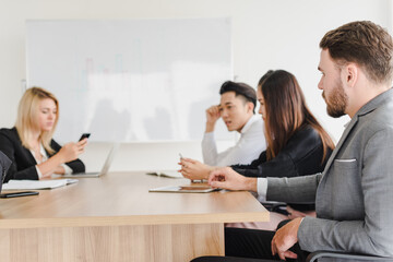 Business people brainstorming ideas for solving problems in company meeting rooms, the company staff meeting.