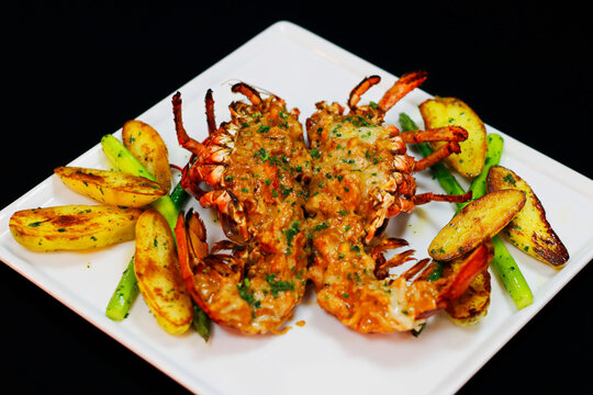  Lobster Thermidor Served With Glazed Potato And Asparagus In A Platter