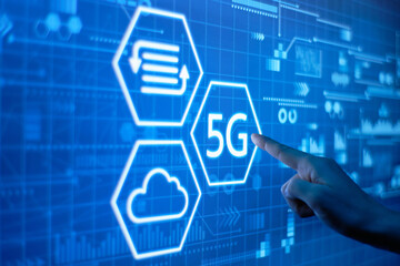 A hand presses on a futuristic mobile network 5g display