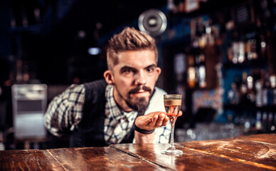 Barman concocts a cocktail on the brasserie