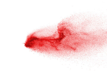 Red powder explosion isolated on white background.
