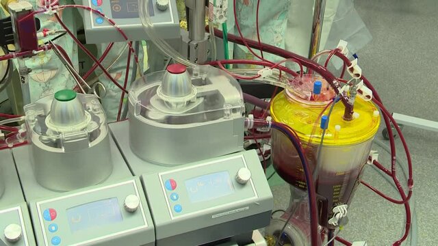 Operation on a stopped heart with a cardiopulmonary bypass machine.