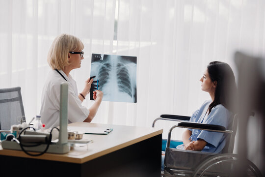 Doctor and patient looking at x-ray