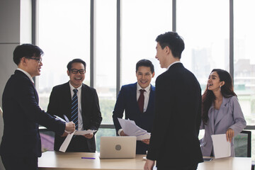 Successful entrepreneurs and business people achieving goals. success and winning concept - happy business team