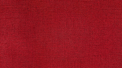 interior wallpaper in red fabric pattern for wall covering (focused at center of image).