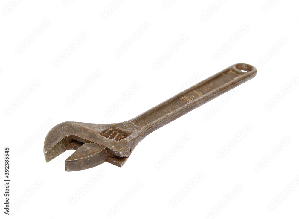 Wall mural Closeup shot of an adjustable wrench isolated on white background