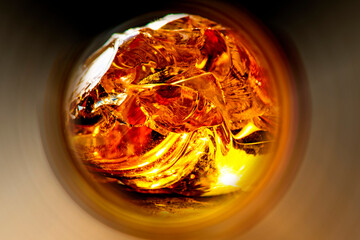 Amber shining bright through a round tunnel